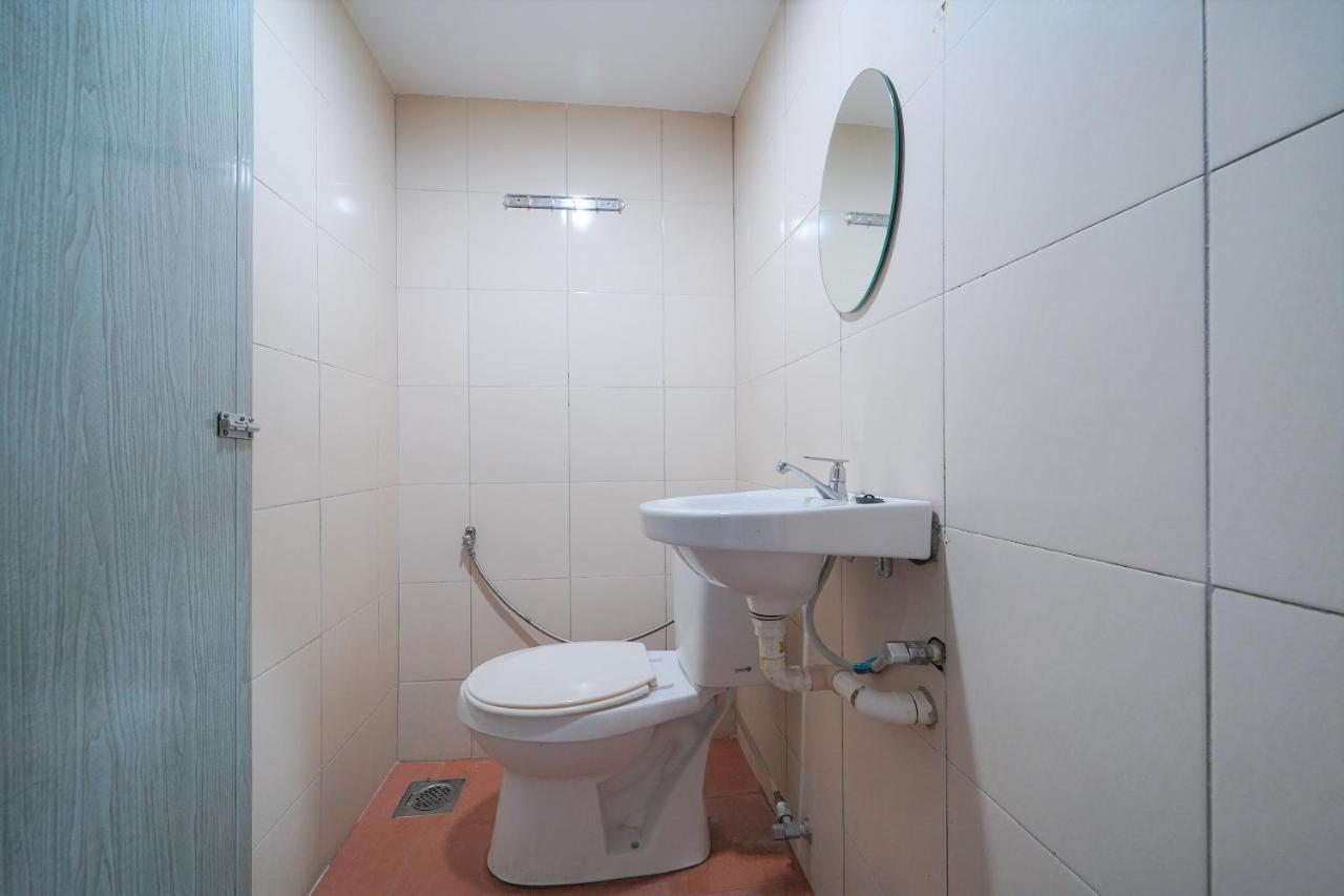 Oyo 89850 Mutiara Motel Kuah Kültér fotó