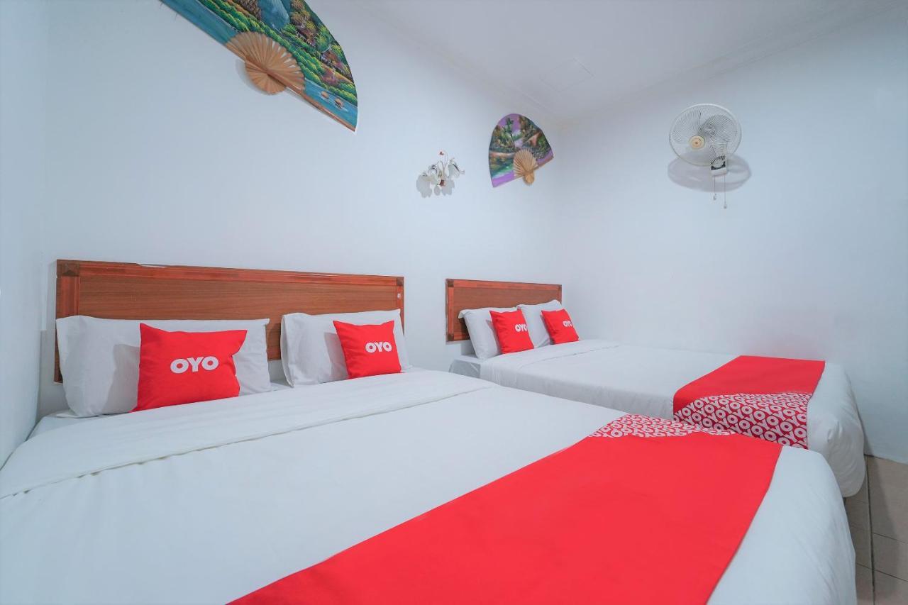 Oyo 89850 Mutiara Motel Kuah Kültér fotó