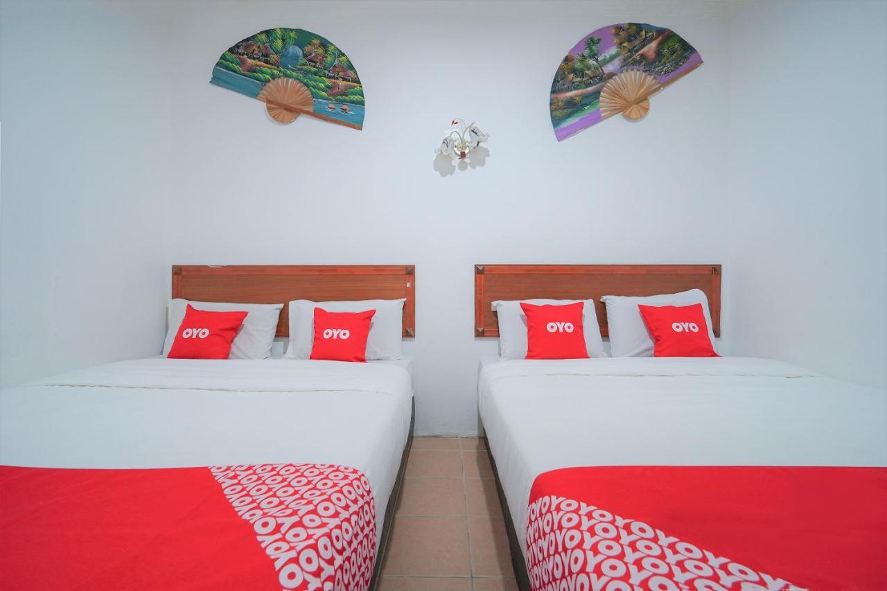 Oyo 89850 Mutiara Motel Kuah Kültér fotó