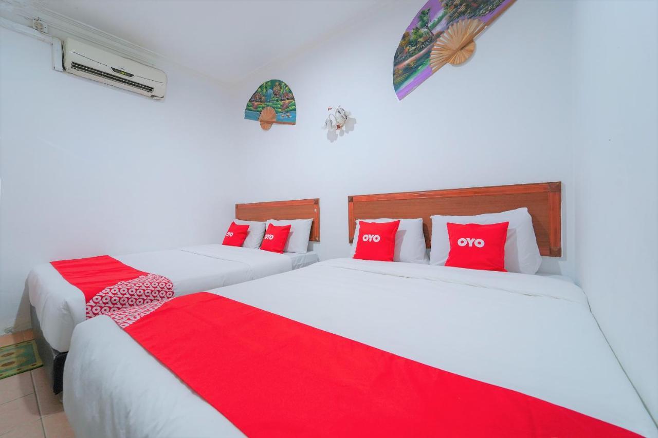 Oyo 89850 Mutiara Motel Kuah Kültér fotó