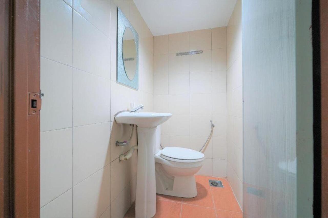 Oyo 89850 Mutiara Motel Kuah Kültér fotó